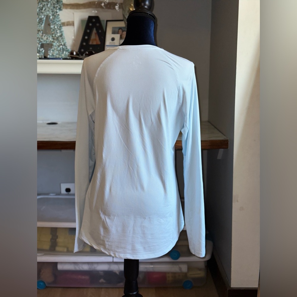 Light blue, long sleeve golf shirt